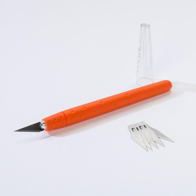 Cortador de precisión con 6 cuchillas de repuesto.